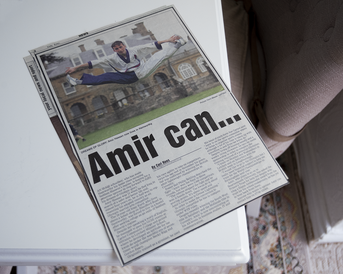 A photograph of newspaper with a caption reading "Amir can.."